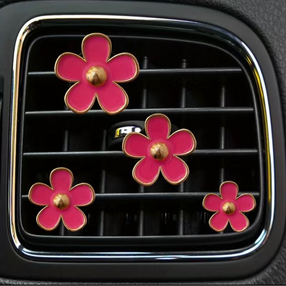 Cute air freshener car decor.  Just clip on your vents.
